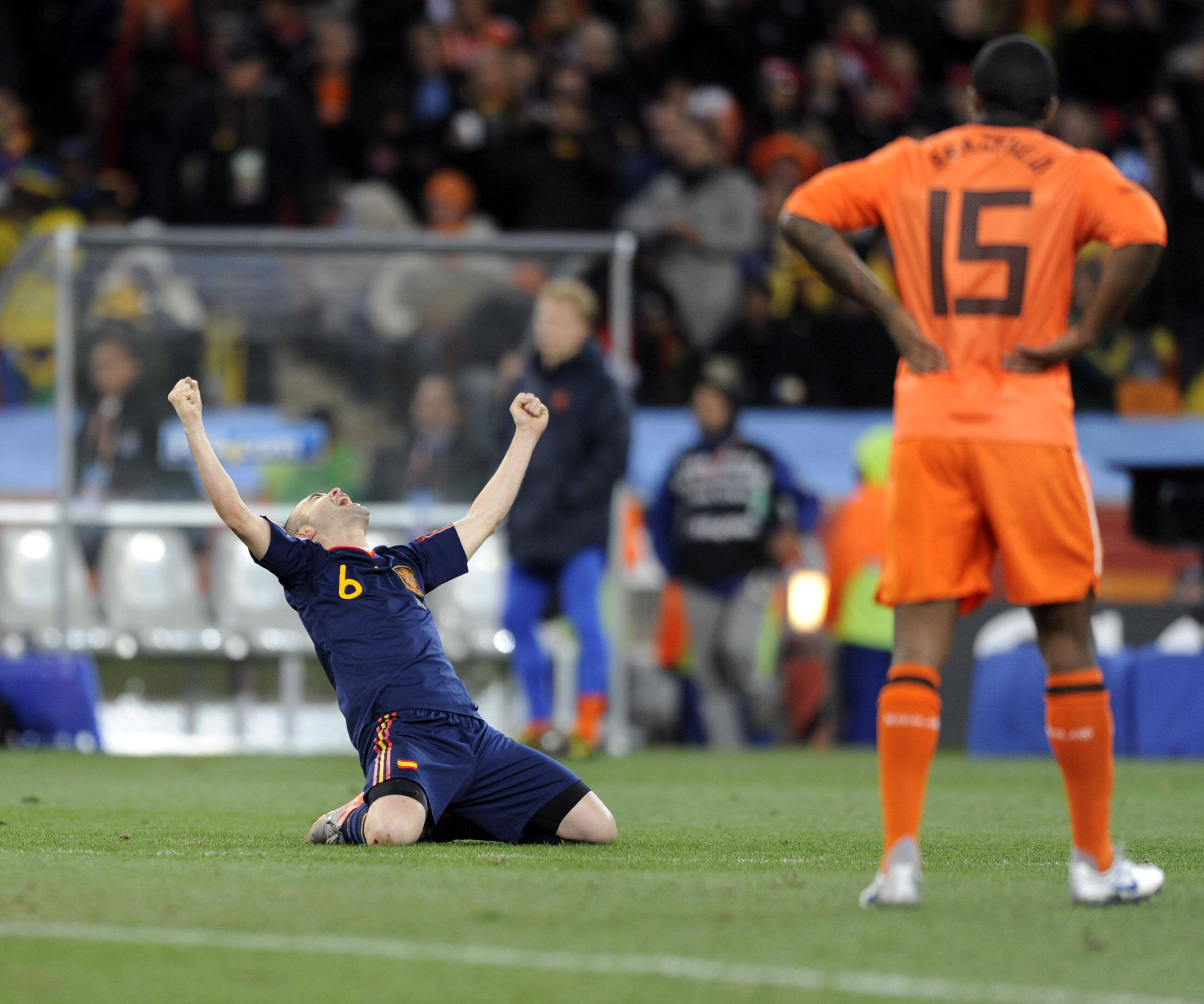 Andrés Iniesta celebrates at the final whistle of the 2010 World Cup final after Spain's victory.