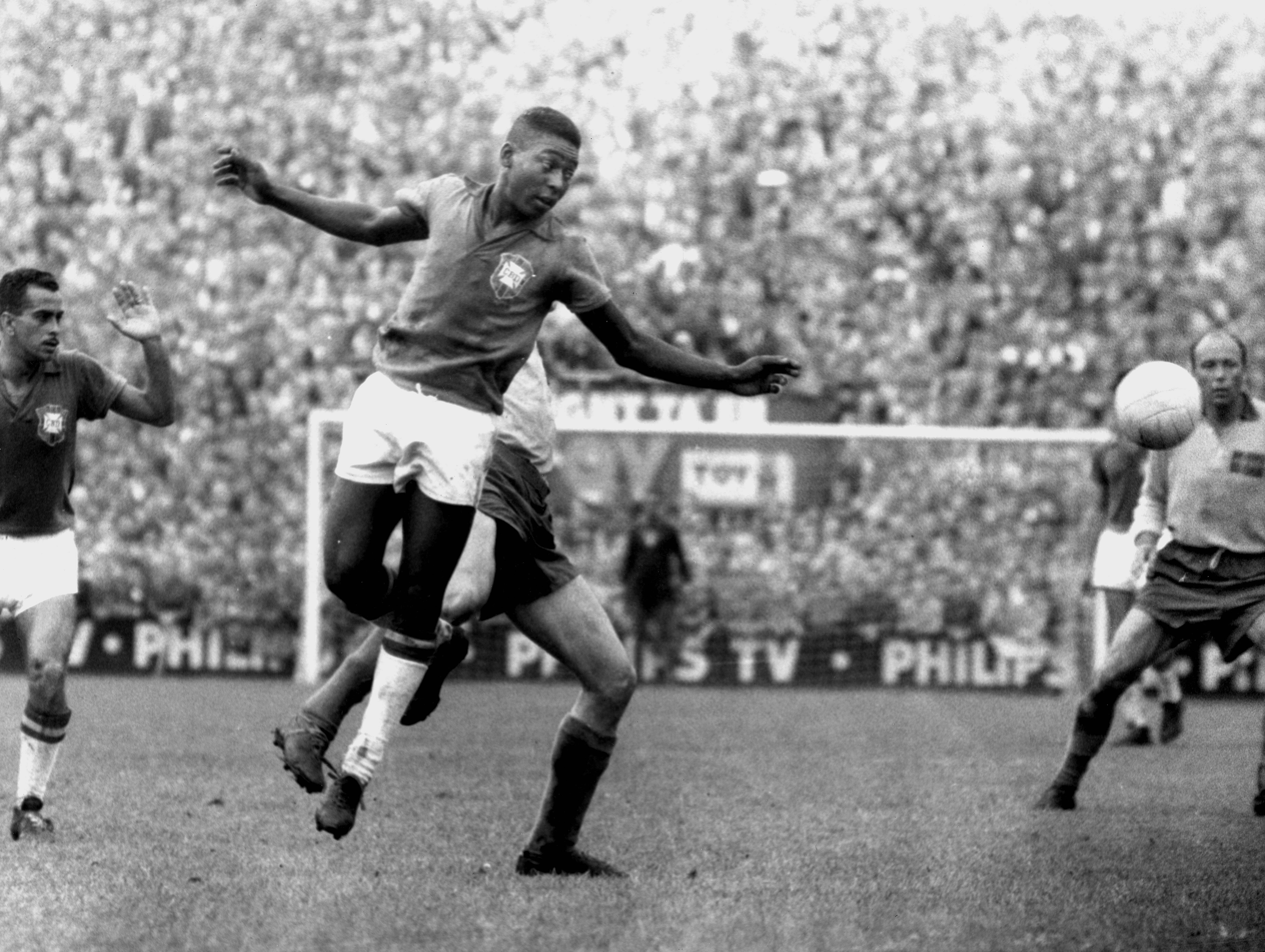Pelé celebrates after winning the 1958 World Cup final in Stockholm, Sweden.